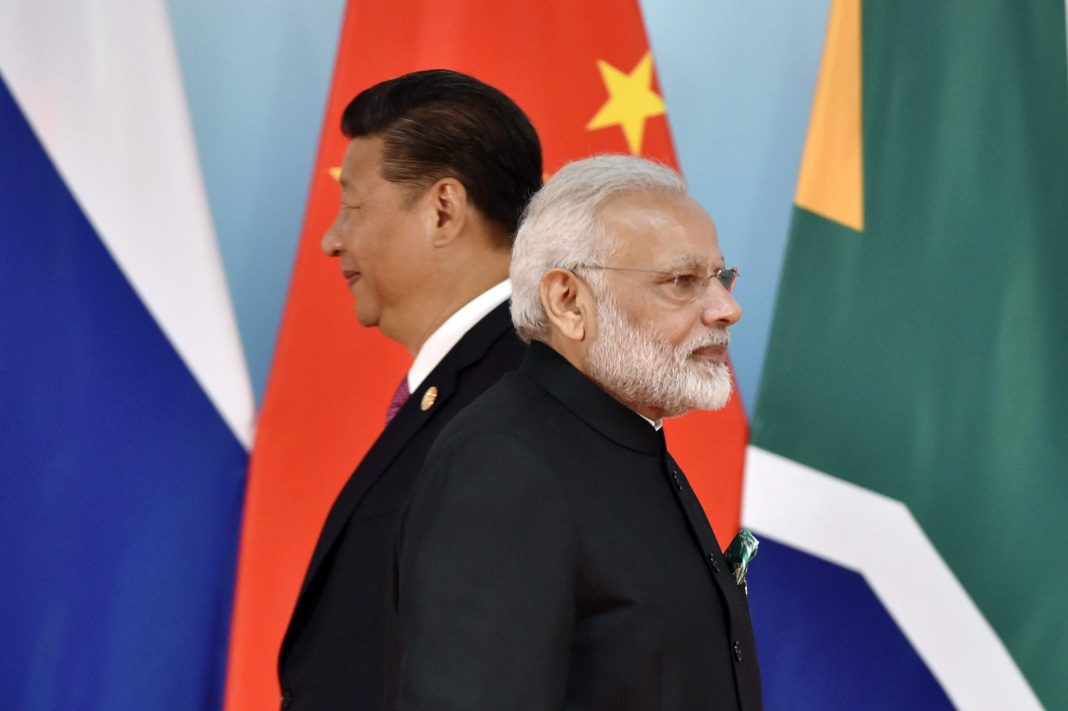 Xi-Jinping-Narendra-Modi-Reuters